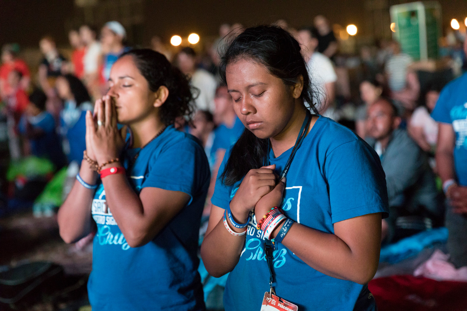 Pilgrims pray during Pope Francis’ World Youth Day vigil at St. John Paul II Field in Panama City Jan. 26, 2019.